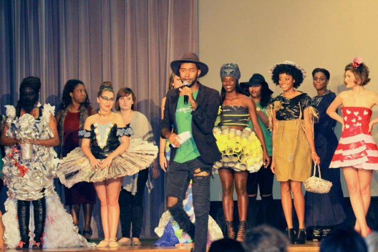 students wearing clothing they designed from recycled materials last fall during a Green is the New Black event for a Blue Jeans Go Green project