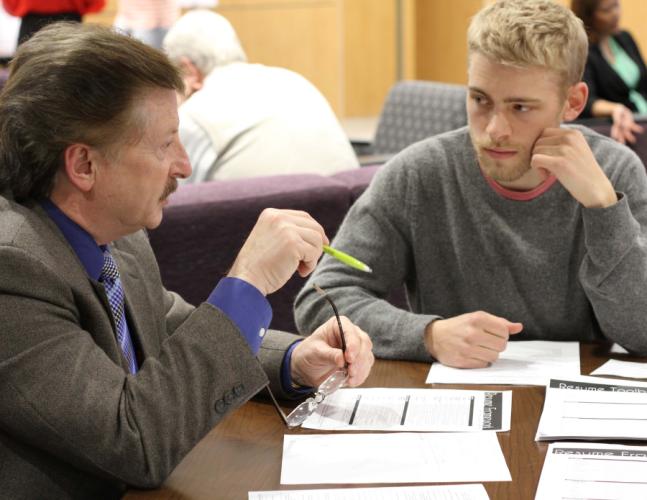 student meeting for one-on-one assistance as part of the Student Success Passport Program