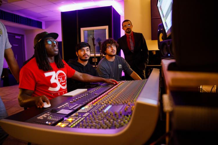 FA Sound Recording Technology Director James Adams oversees students working via Dante networking on campus.