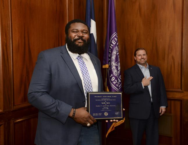 Saville Harris with Dr. Scott Gordon, SFA president