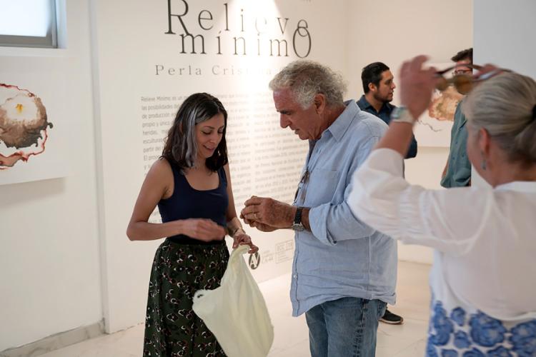 Fenci speaks with Perla Cristina Garcia