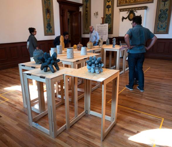 Fenci attending an art exhibit of well-known Mexican ceramicists