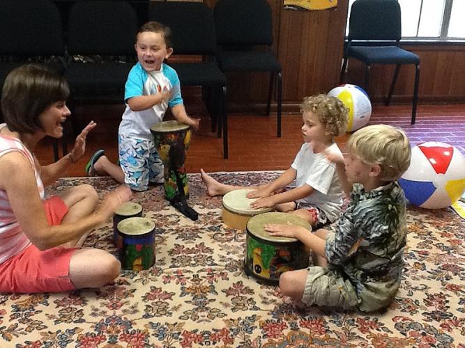 Karen Greer, a certified Kindermusik teacher for the SFA Music Preparatory Division, leads young students Sean Ollan Crager, Jackson Collier and Isaac Collier in a lesson at the Music Prep House.