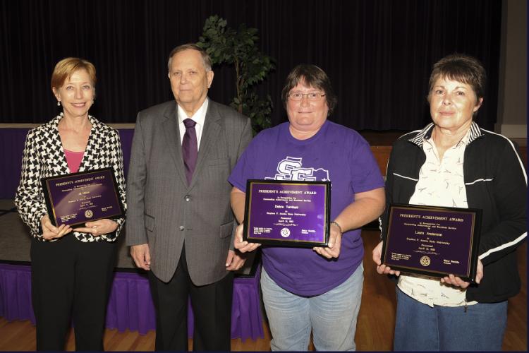 SFA employees receiving the President's Award in recognition of outstanding achievement and excellent service