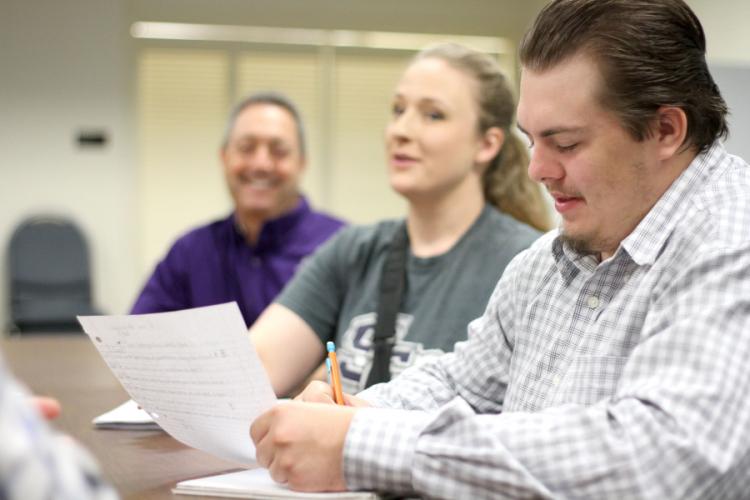 Stephen F. Austin State University senior accounting majors Anthony Wiley and Savanah Skelton interview members of SFA's physical plant during a mock internal audit.