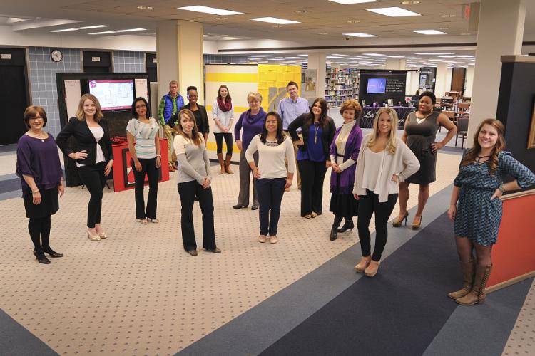 senior interior design students showcasing their work