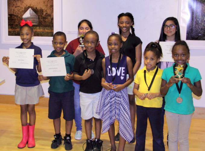 a photo of some of the participants in this year's ImageMakers photography exhibition