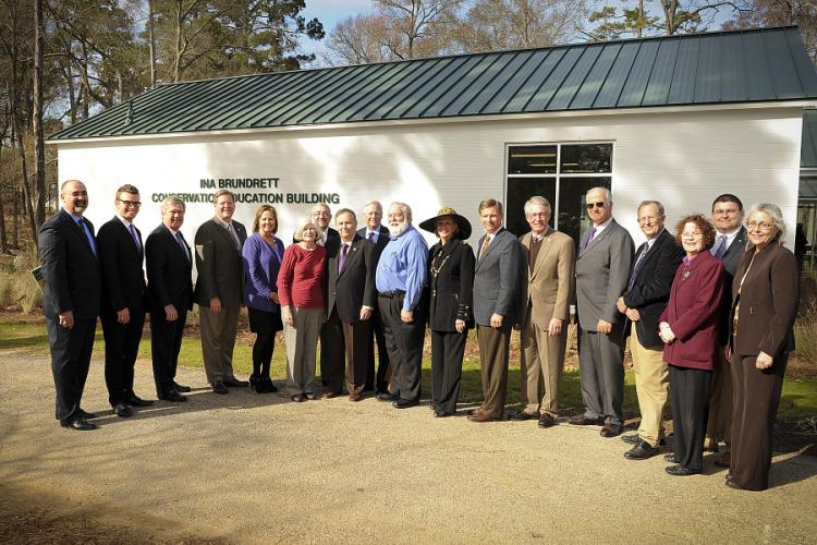 A ribbon-cutting ceremony marking the official opening of the newly constructed Ina Brundrett Conservation Education Building was held Monday in SFA's Pineywoods Native Plant Center.