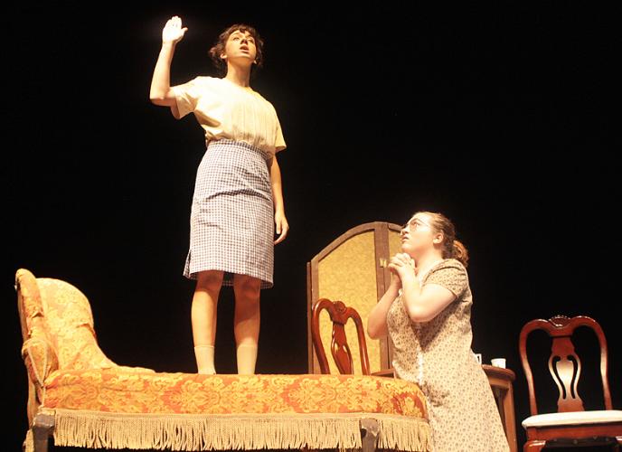 a scene from a performance during the High School Summer Theatre Workshop
