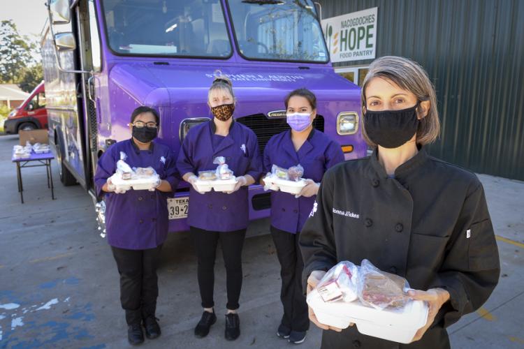 students and faculty of SFA’s Lumberjack Express