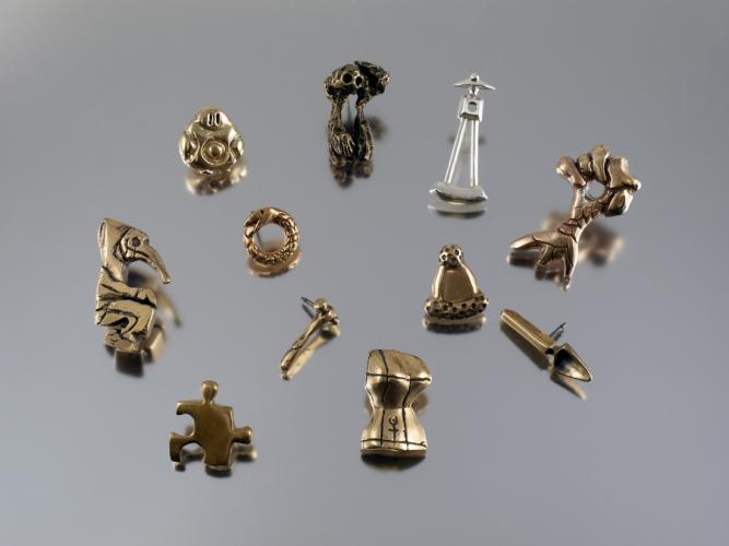 a collection of work by SFA metal/jewelry students 