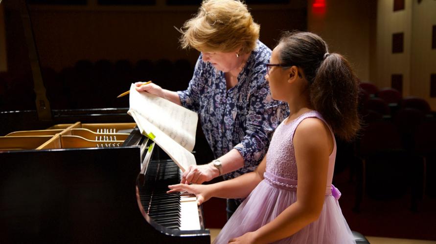 Ms. Linda Parr teaching a piano student at the SFA Music Prep House