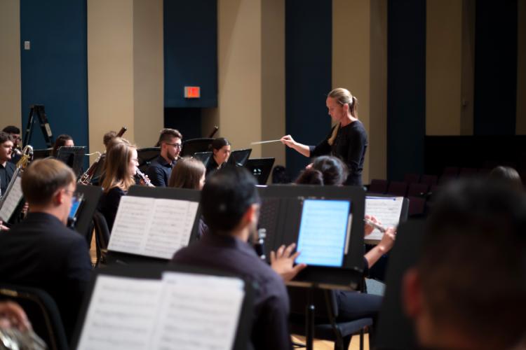 SFA Director of Bands Dr. Tamey Anglley conducts the Wind Ensemble