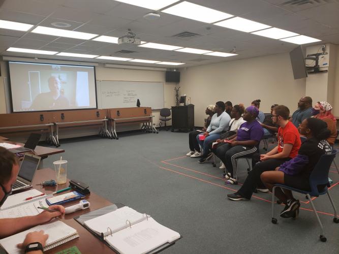 Veteran actor and SFA theatre alumnus Xzavien Hollins discusses his stage career via Zoom with members of the SFA cast of the upcoming production of “Bootycandy.”