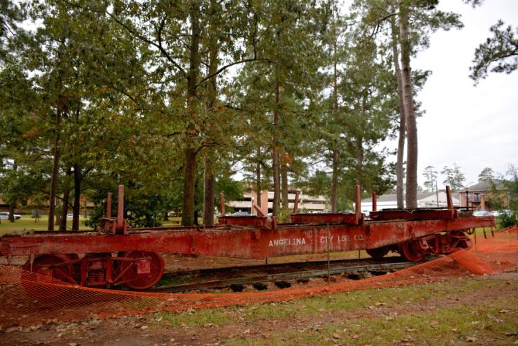 The Angelina County Lumber Company log car located outside of Stephen F. Austin State University’s Forestry Building