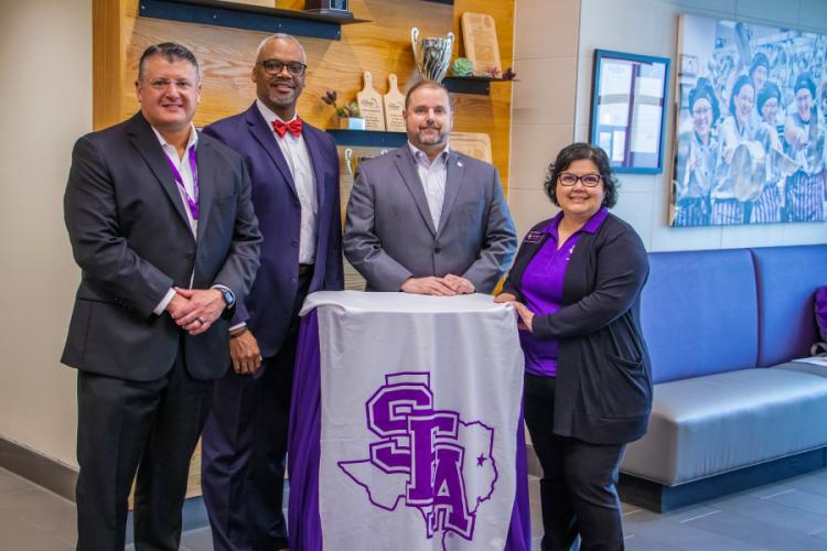 Dr. Kelvin Stroy, Rockwall ISD chief student services officer; Dr. John Villarreal, Rockwall ISD superintendent; SFA President Dr. Scott Gordon; and Erma Nieto Brecht, SFA executive director of enrollment management.