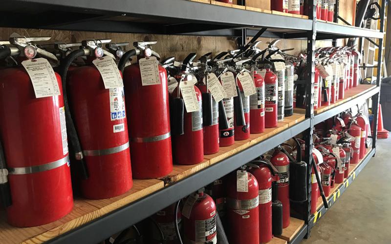 Fire extinguishers on shelf