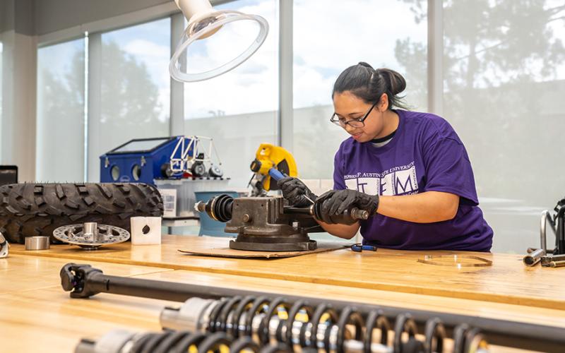 A Mechanical Engineering student works on a project