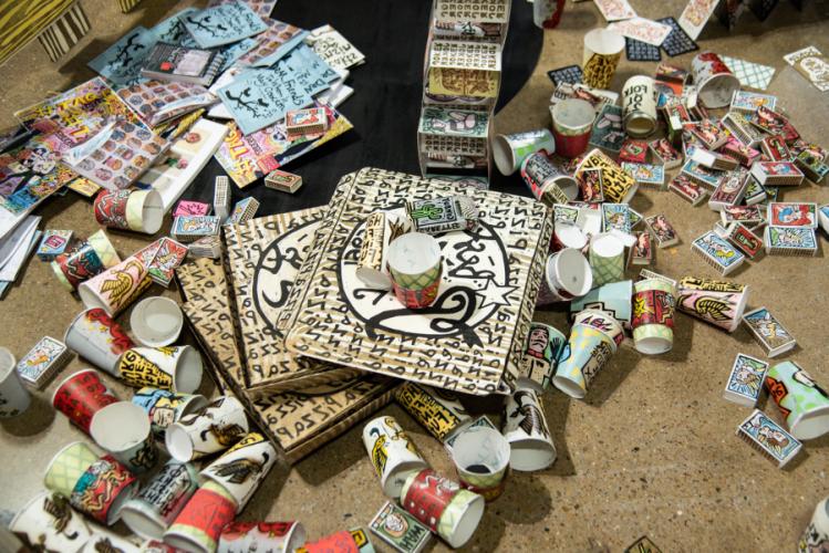 3D forms featuring small cartoonish drawings created by Swedish artist John Rasimus