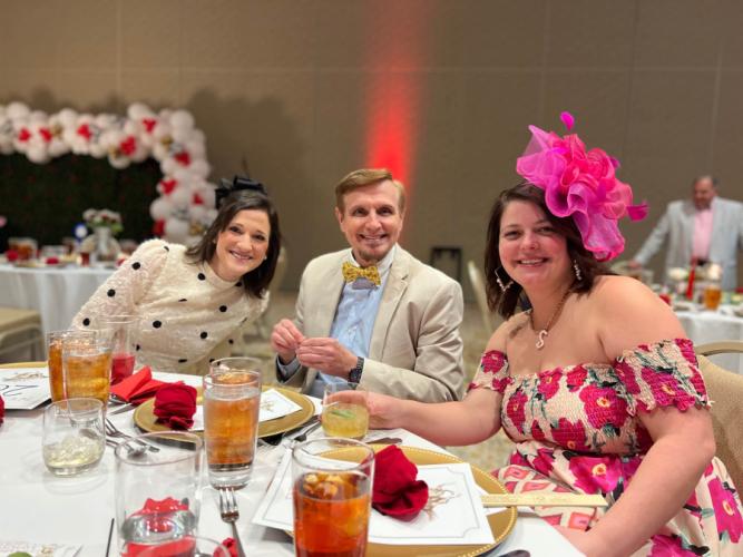 The 2022 Kentucky Derby dinner photo of Amie Morton, SFA Alumni Association coordinator of events and engagement; Dr. Larry King, professor in SFA’s Department of Languages, Cultures and Communication; and Samantha Mora, Alumni Association director of events and engagement.