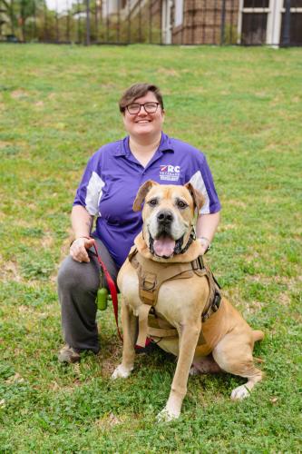 Stesha Colby-Lynch and her service dog, Hercules.
