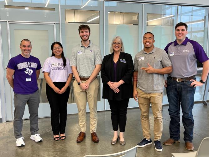 Drew Thornley, associate professor of business law; Angelica Rocha, English senior from Arlington; Jake McDonald, finance senior from Allen; Dr. Lucia Sigmar, associate professor of business communication; TKai Lloyd, general business senior from Houston; and William Hartwell, business communication corporate development senior from Houston