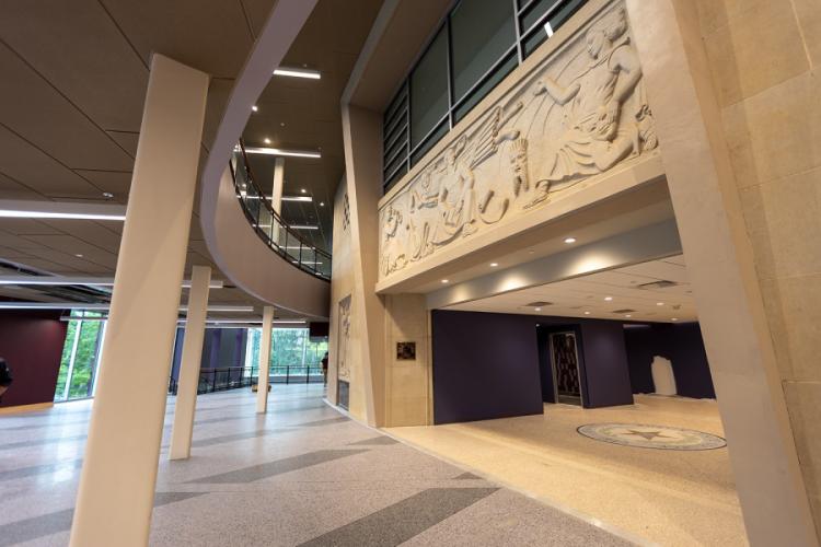 The stone reliefs by German/American sculptor Anton Grauel at the former entrance of Griffith Fine Arts Building on the SFA campus were carefully preserved and now incorporated into the interior of the newly renovated and expanded building.