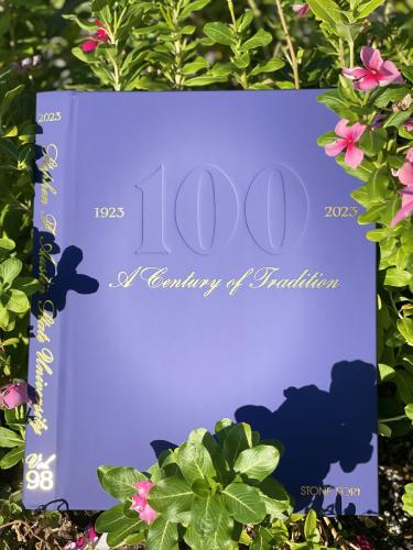 The cover of Stephen F. Austin State University’s 2023 Stone Fort yearbook features debossed numerals and gold foil lettering.