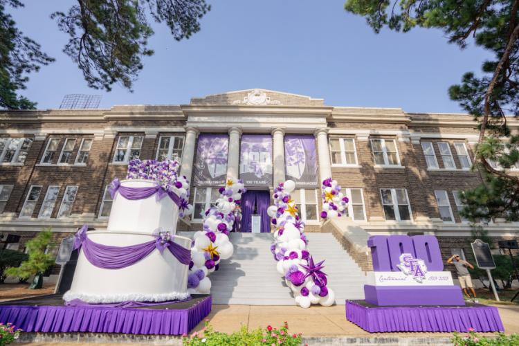 front of the Austin Building decorated for the Centennial Celebration