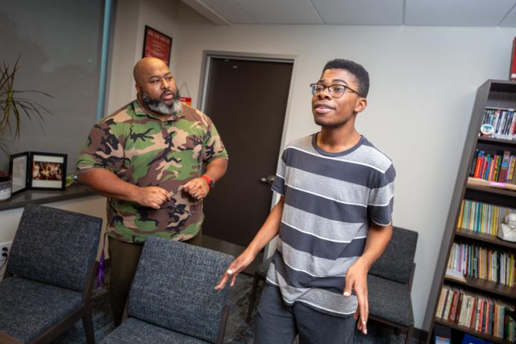 Cleo House Jr., director of the SFA School of Theatre and Dance, runs lines with Houston sophomore Erik Colbert Jr., who plays the role of Boy Willie in SFA’s presentation of August Wilson’s “The Piano Lesson.”