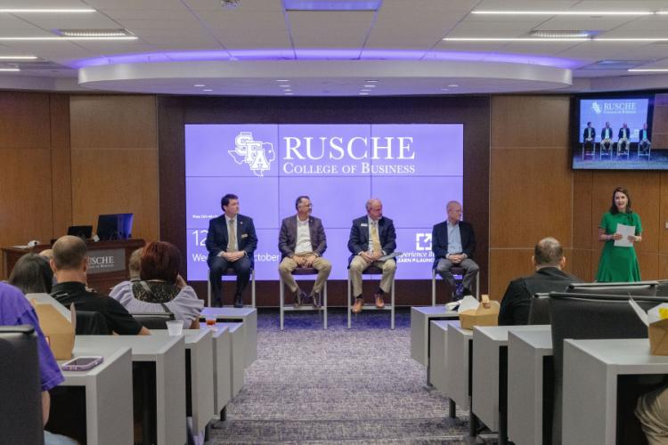 Panel moderator Judy Larson Olson former Stephen F. Austin State University regent and senior vice president at Woodforest National Bank in The Woodlands, leads the panel discussion “Why Choose Banking” at SFA’s “Bank on Your Future” career exploration day.