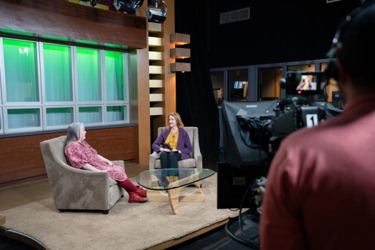 Kelly Augustine, hief executive officer of the Nacogdoches County Chamber of Commerce, interviews Crystal Hicks, Nacogdoches Public Library director.