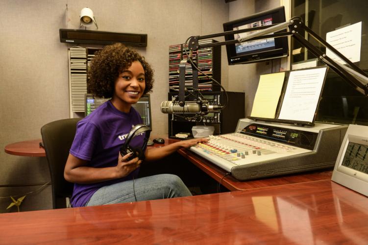 student working the radio station