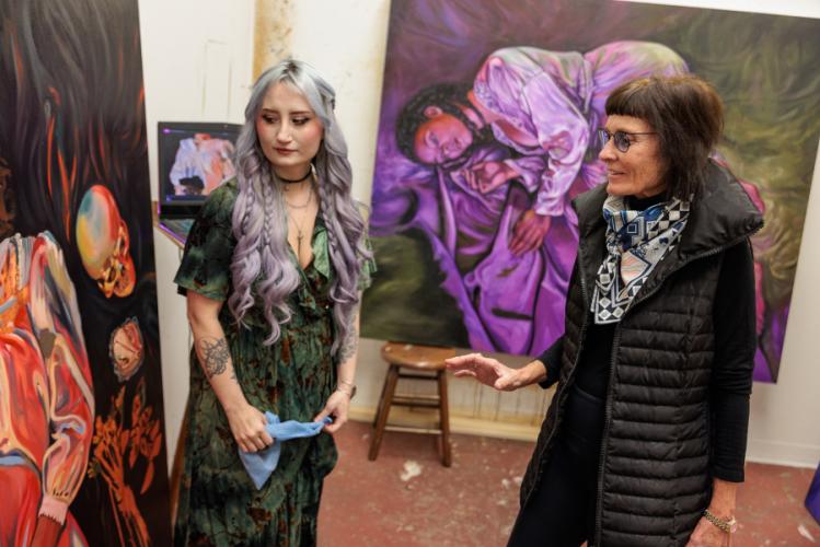  Alexandria Wooldridge, a graduate student in Stephen F. Austin State University’s School of Art, pictured left, receives constructive criticism from Susie Kalil, a nationally recognized writer and curator.