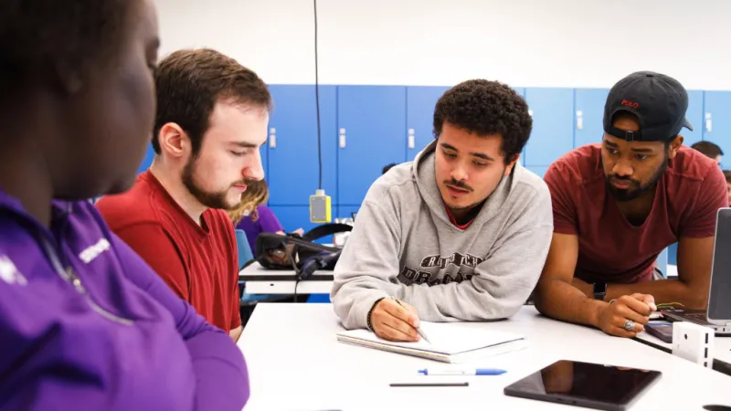 Students discussing coursework
