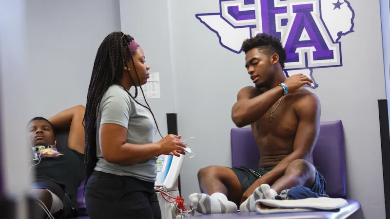 Student receiving physical therapy