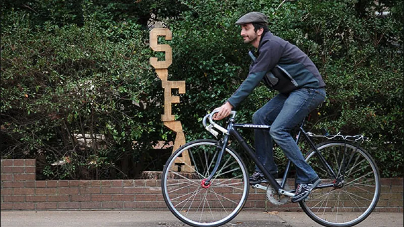Student riding bicycle