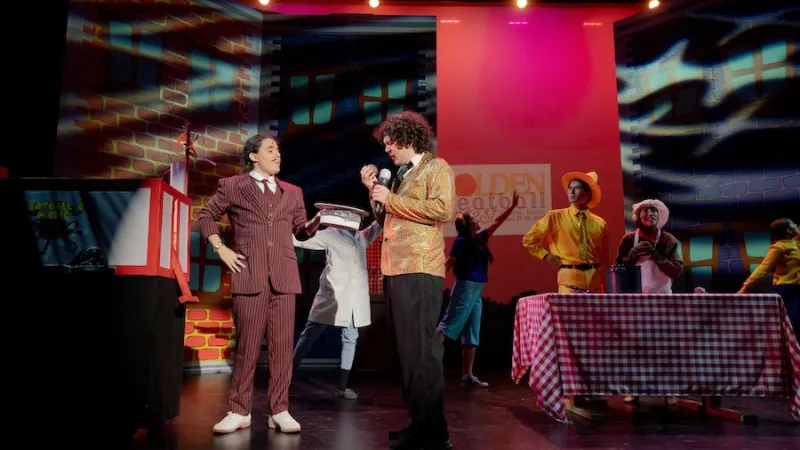Theatre students performing Curious George