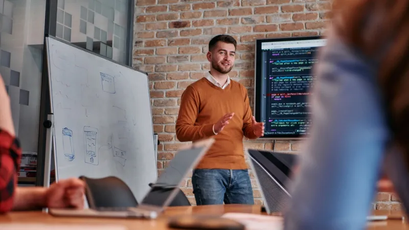 man leading a professional development meeting