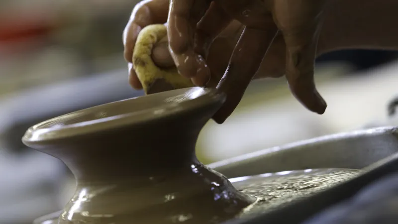 Closeup of student creating with clay