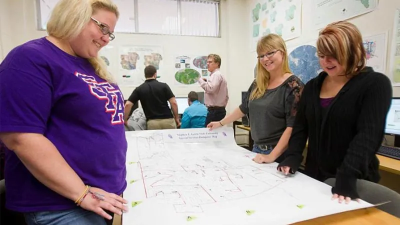 Students looking at a map