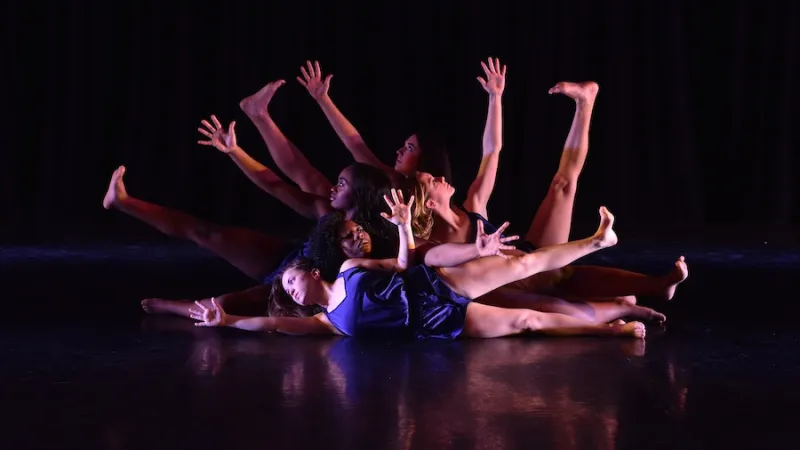 Dance students performing on stage