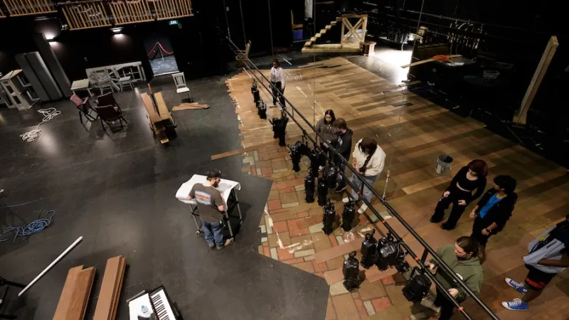 Theatre students working on set design