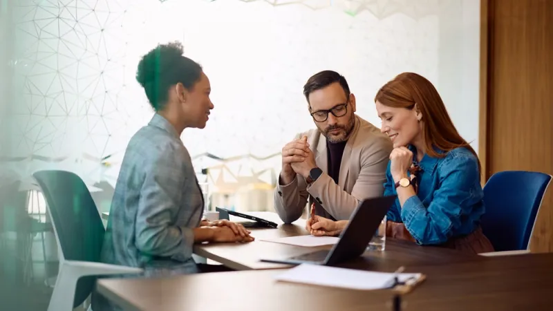 financial planner meeting with clients