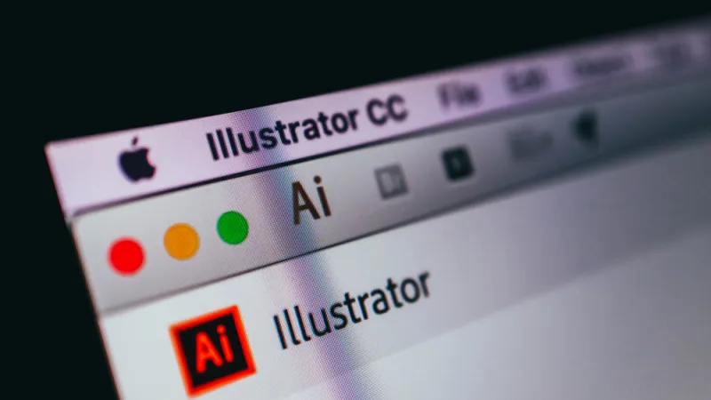Adobe Illustrator application on a screen of macbook, close-up.