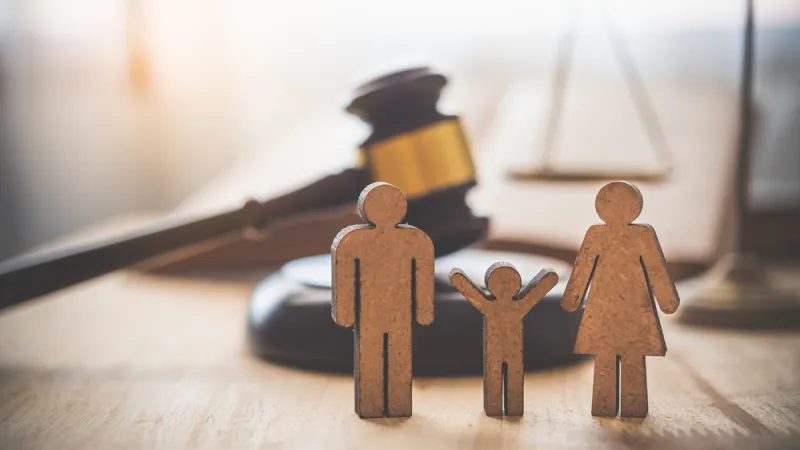 family-figure-gavel-on-table-law