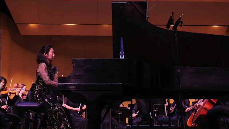 Dr. Minhae Lee performs with the SFA Orchestra