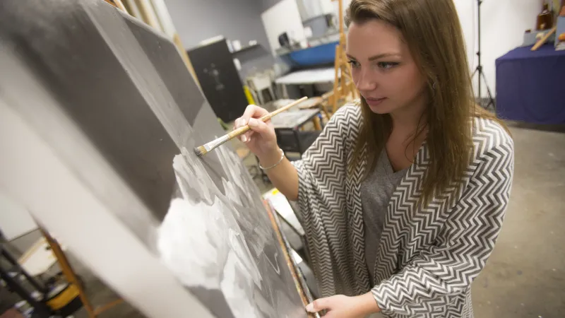 Student painting grayscale
