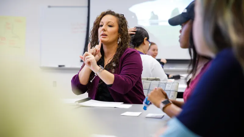 Instructor teaching ASL