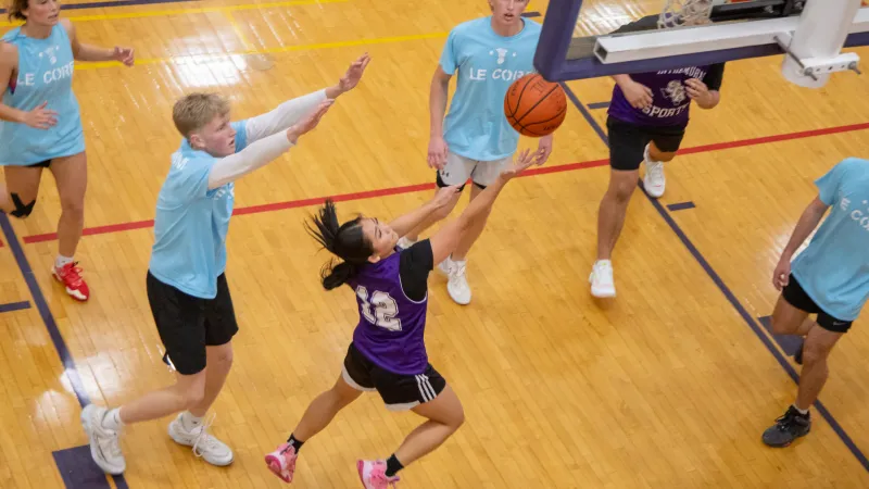 Students playing basketball